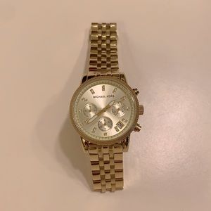 Michael Kors stainless steel “gold” watch